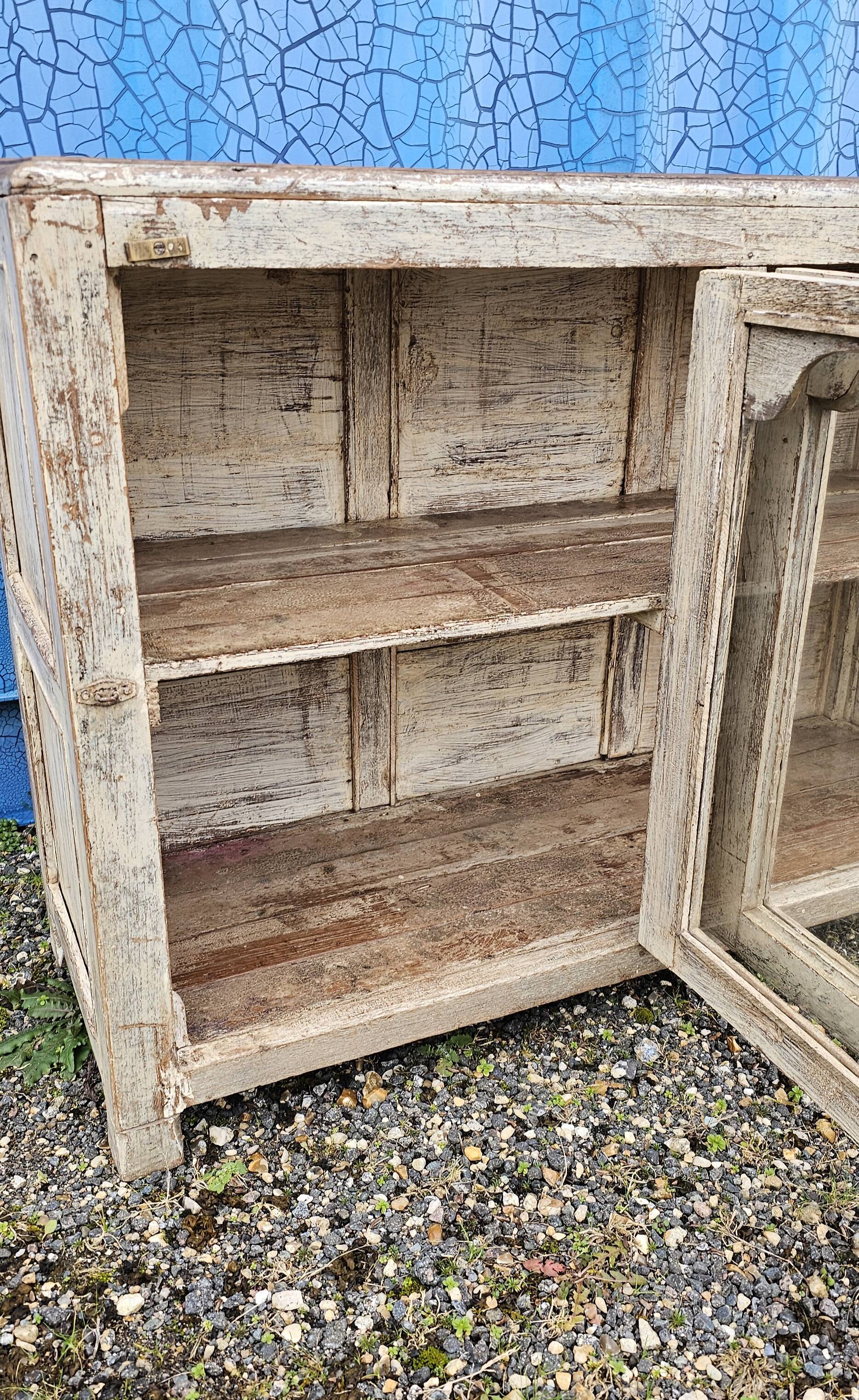 Vintage glass-fronted teak sideboard