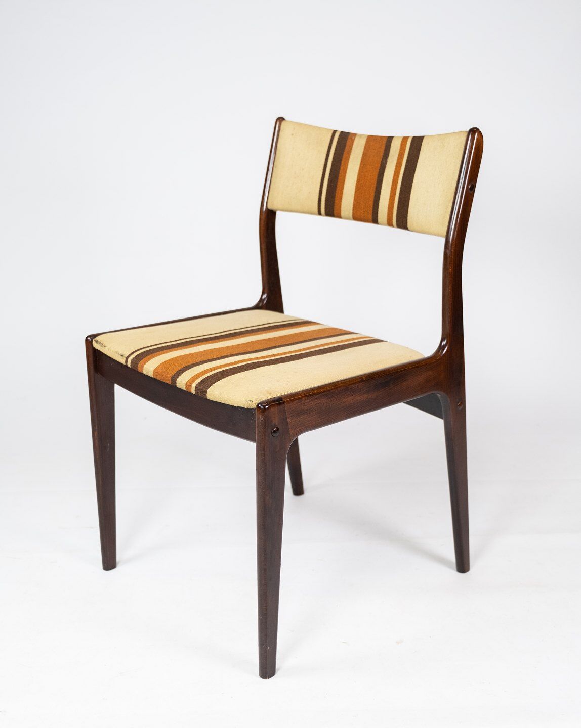 Pair of chairs in dark wood upholstered with light striped fabric of danish design