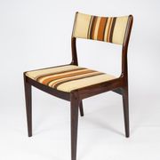 Pair of chairs in dark wood upholstered with light striped fabric of danish design
