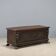 Antique walnut chest with carved front, Italy, 19th century.