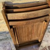 Three wooden folding chairs