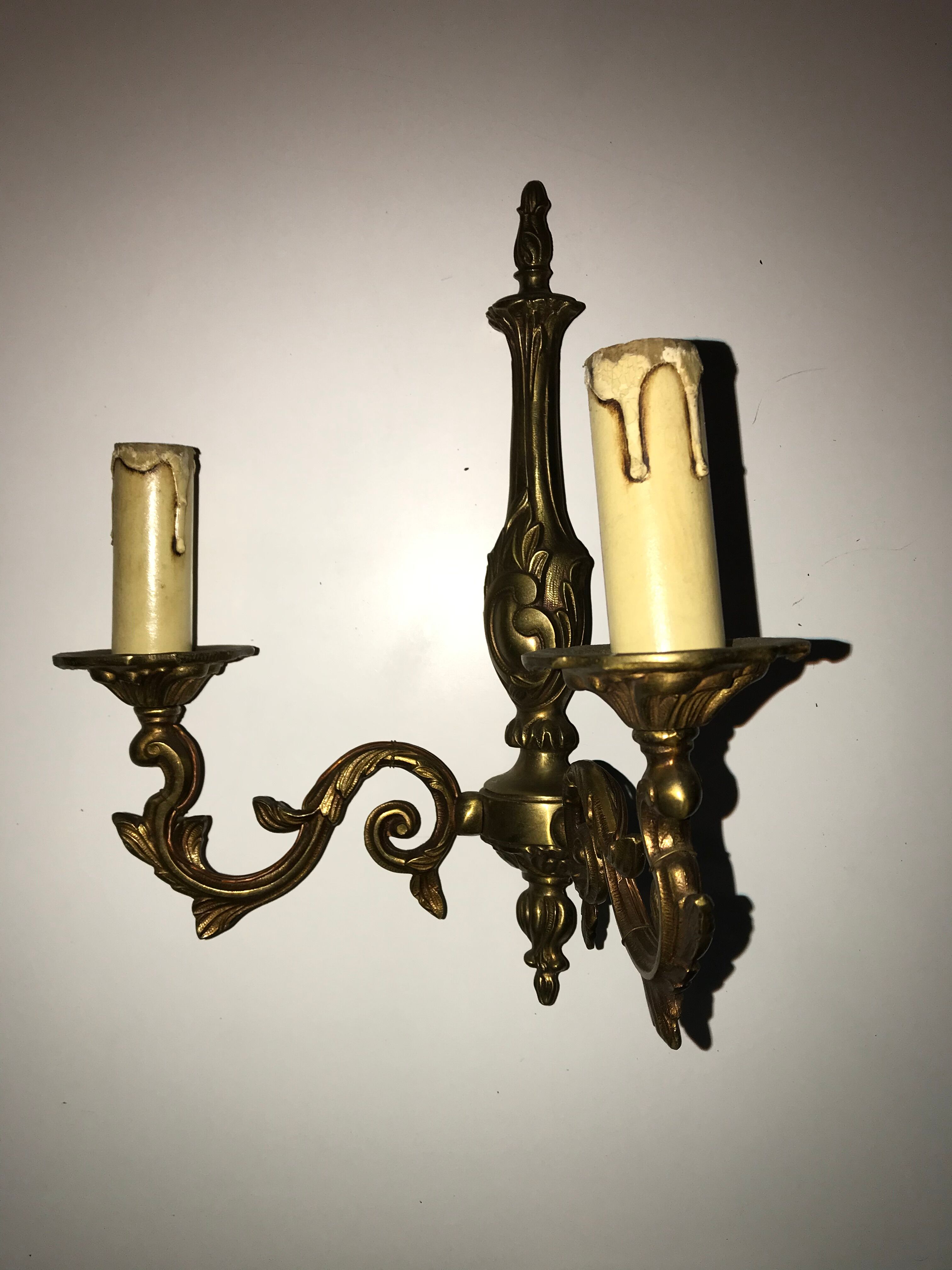 Pair of Louis XV style bronze wall sconces