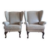 Paire de fauteuils  à  oreilles