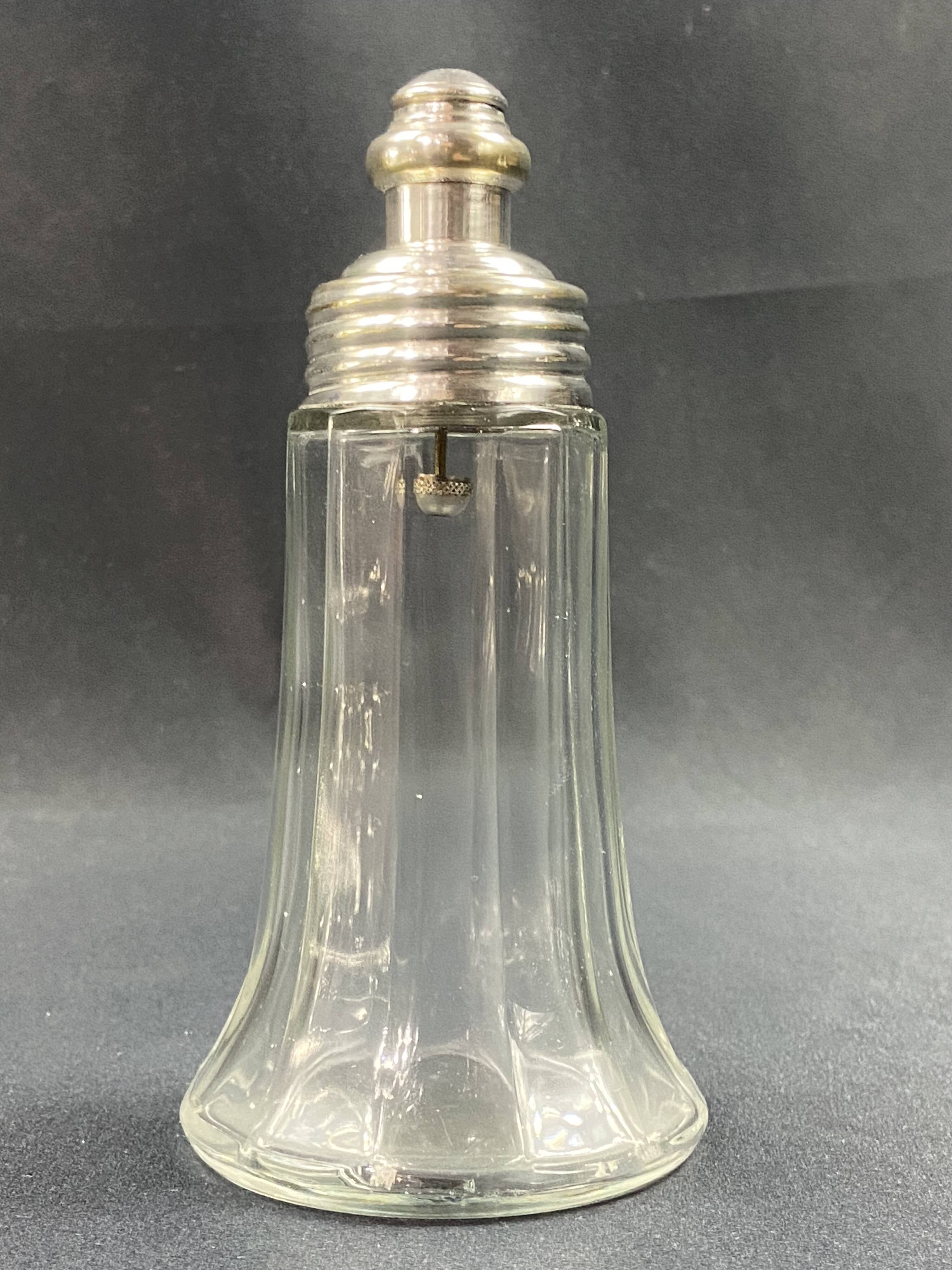 Glass and silver metal sugar shaker