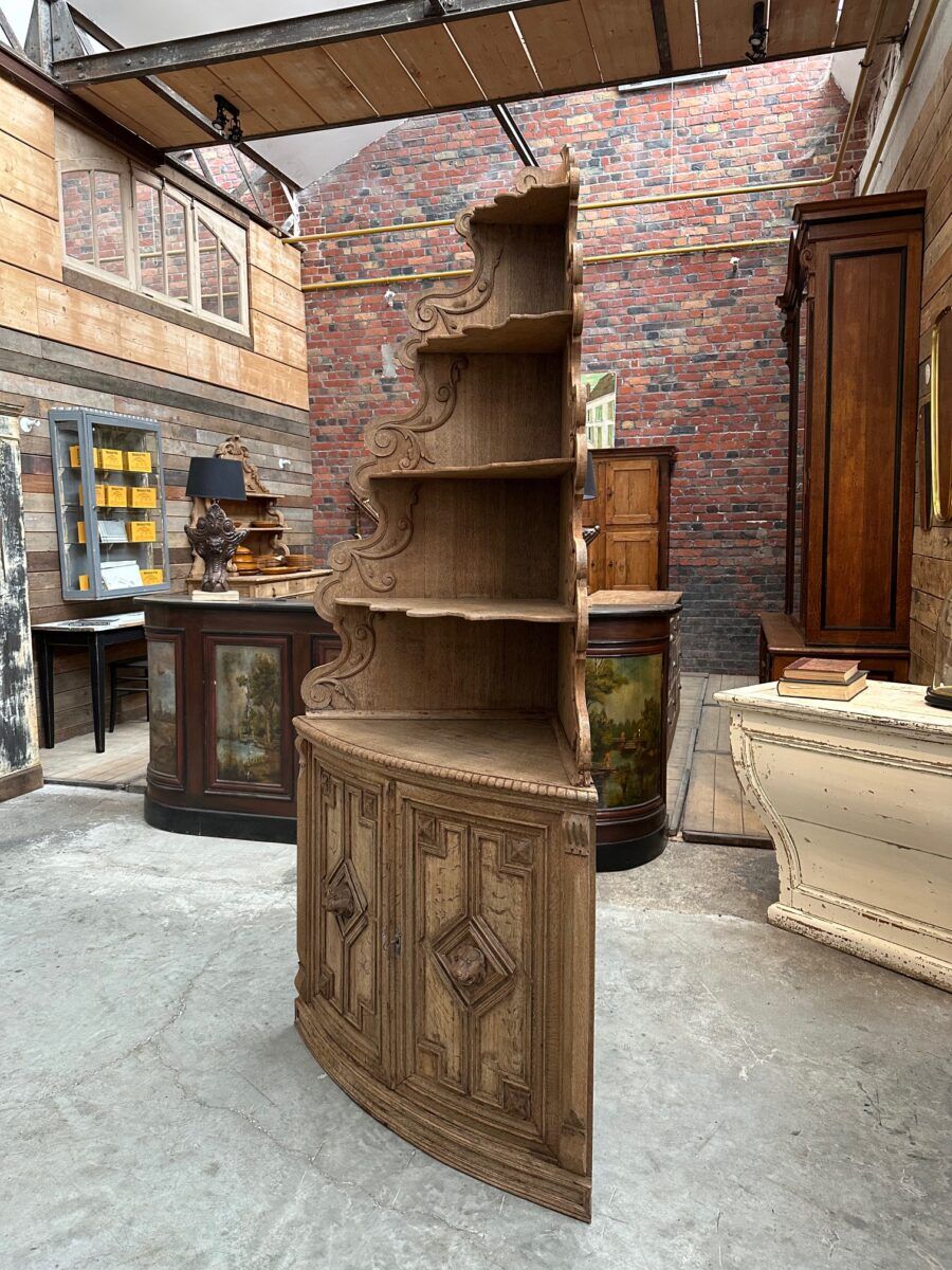 Corner cabinet in oak, late 19th century.
