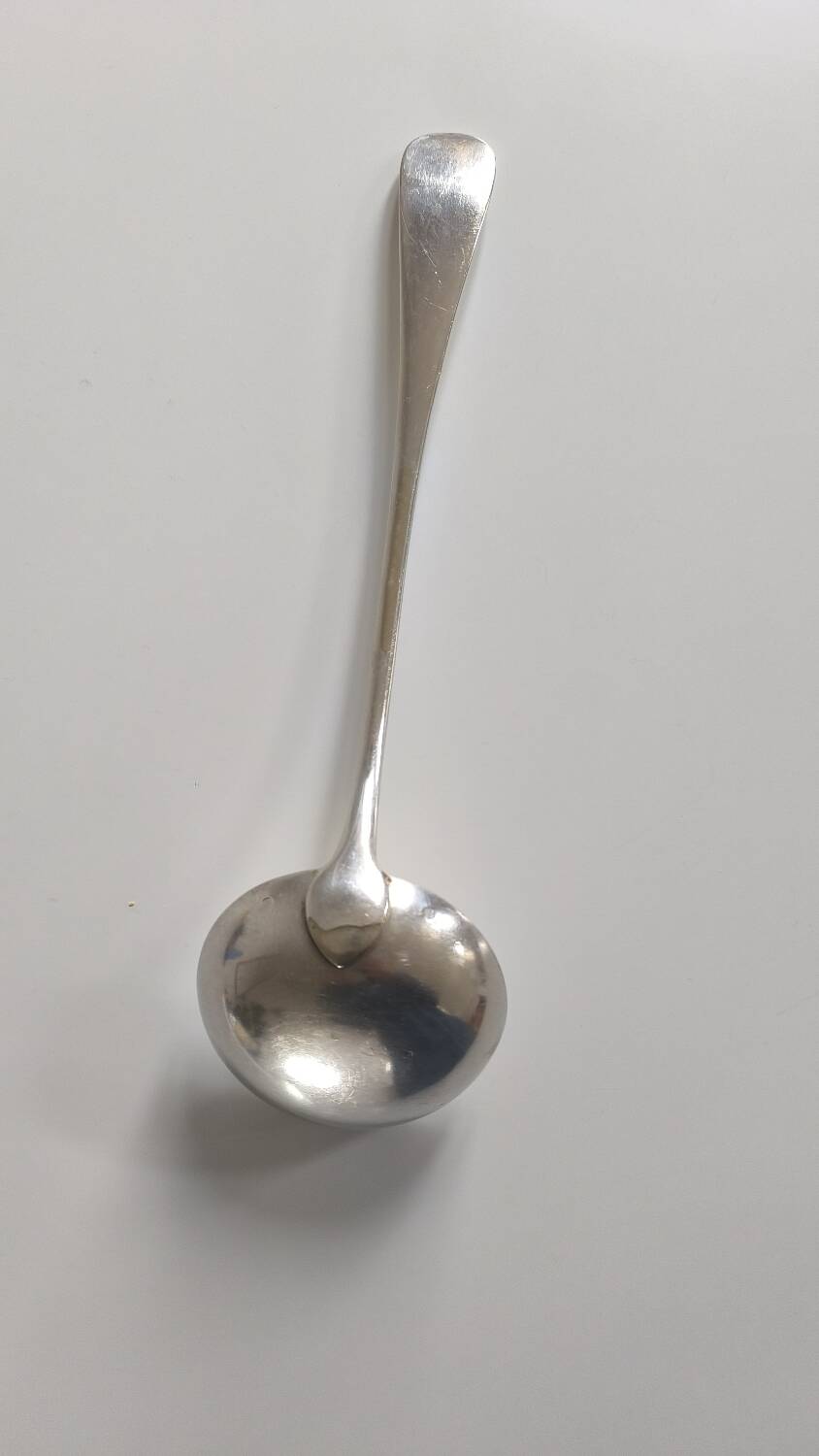 Solid silver serving ladle