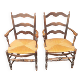 Pair of blackened wooden armchairs
