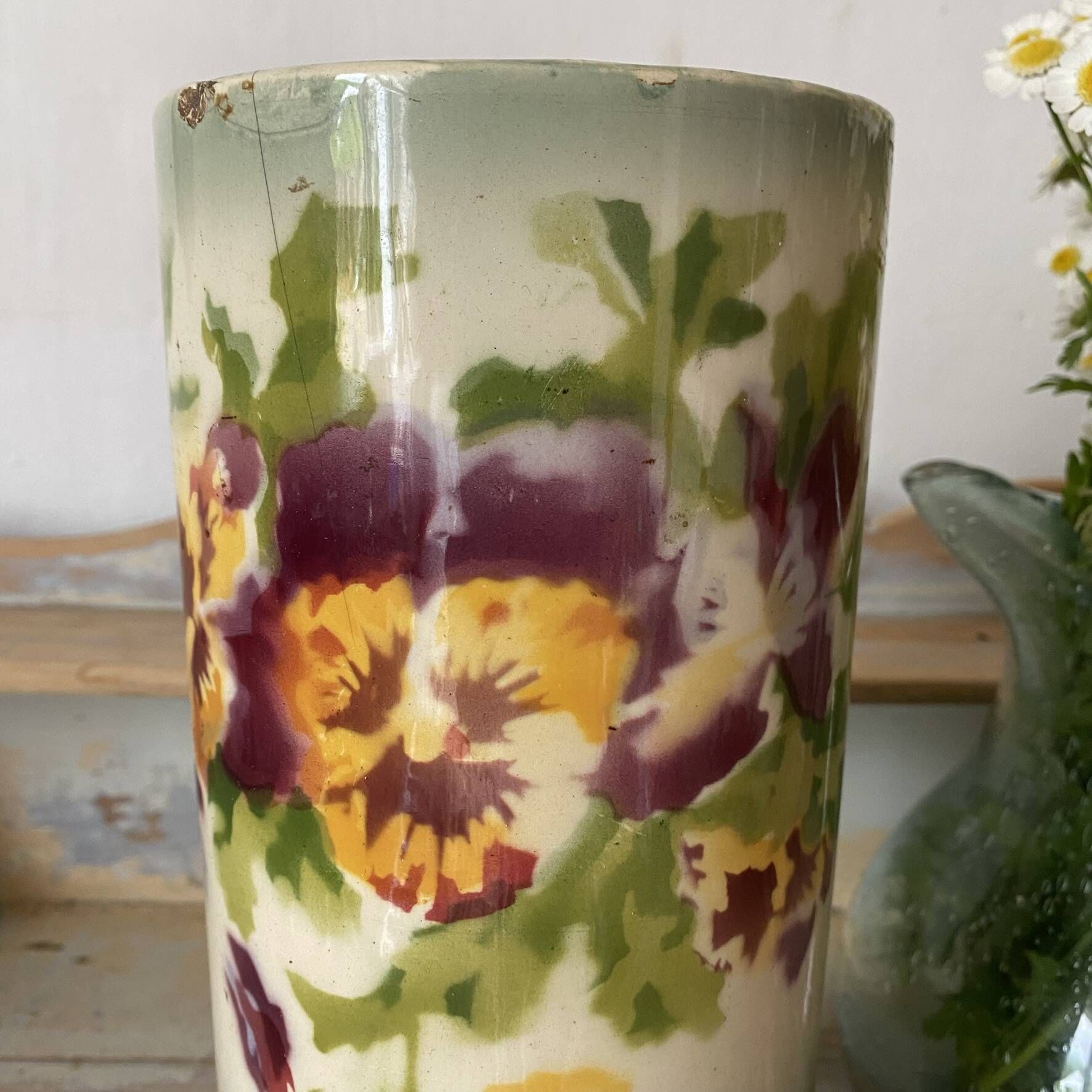 Large tubular vase in Choisy-le-Roi earthenware, decorated with pansies.