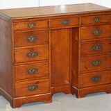 Small Victorian desk in solid walnut with drawers.