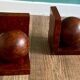 Pair of bookends adorned with spheres