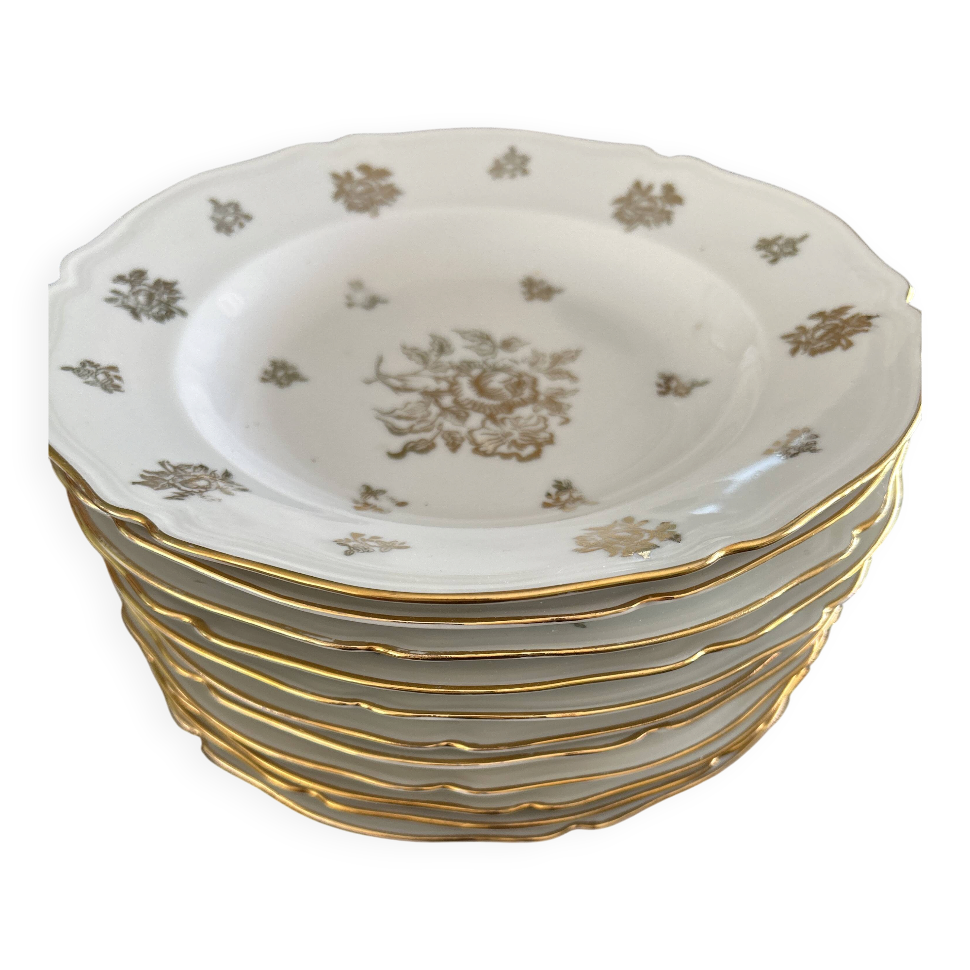 This white porcelain plate features a scalloped edge and elegance.