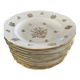 This white porcelain plate features a scalloped edge and elegance.
