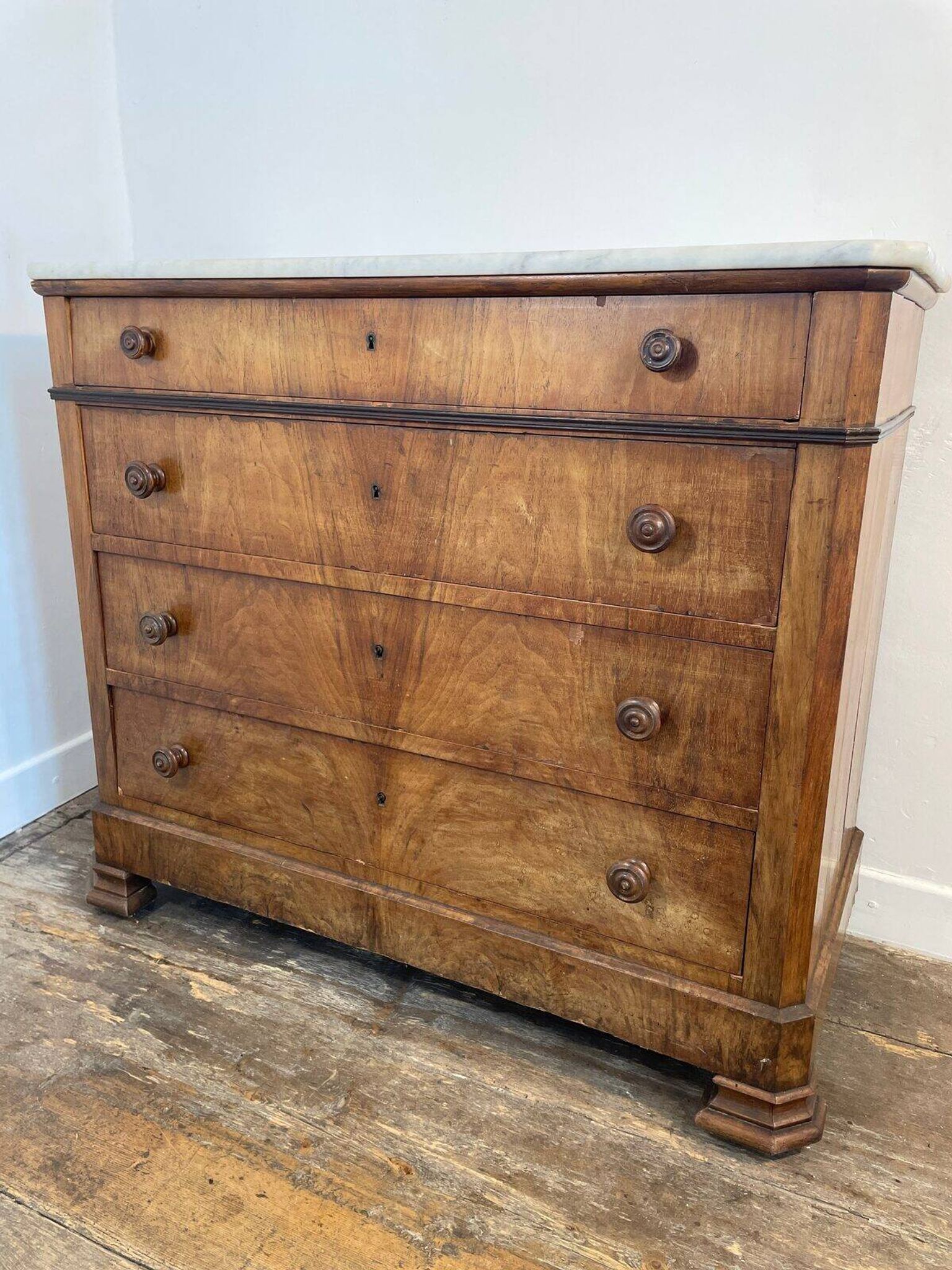 Antique walnut commode with marble top, 19th century.