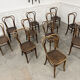 Suite de 12 chaises de bistrot à gaufrage végétal 1920