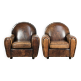 Set of two sheepskin Art Deco design armchairs with beautiful patina