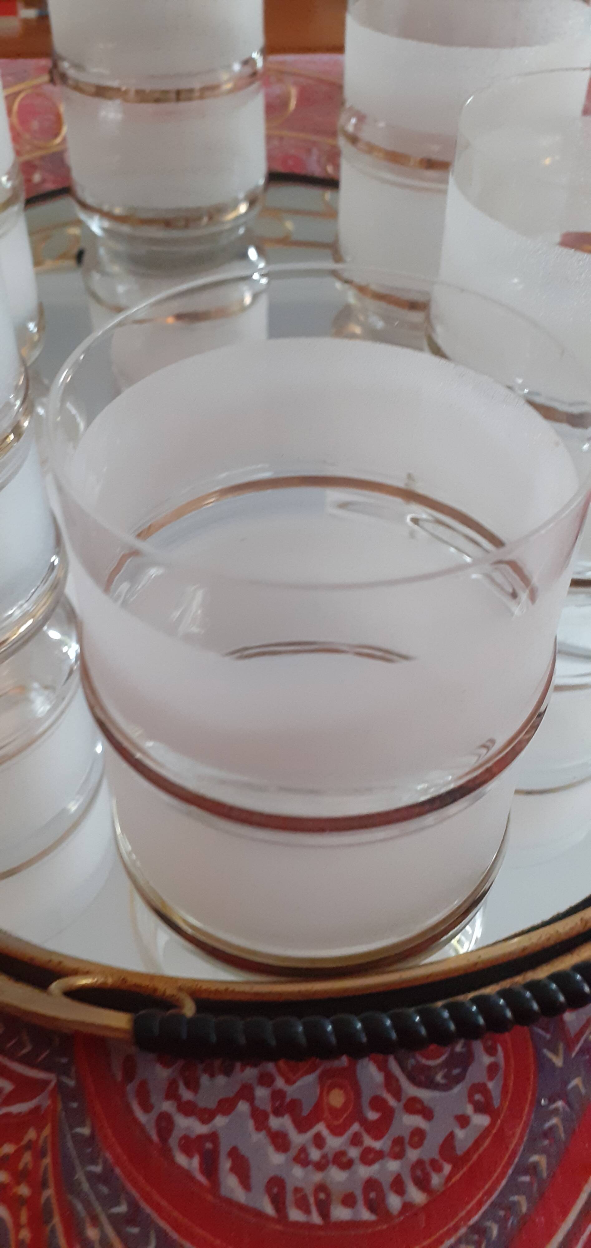 Vintage gilded and ganulated glasses, and their tray
