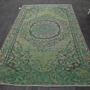Vintage green and olive Turkish rug with a medallion, hand-knotted, 160 x 262 cm.