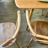 Set of 2 Windsor chairs with armrests.