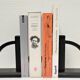 Pair of bookends in black lacquered steel design 60s