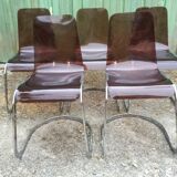 Chairs in plexiglas with chrome metal base