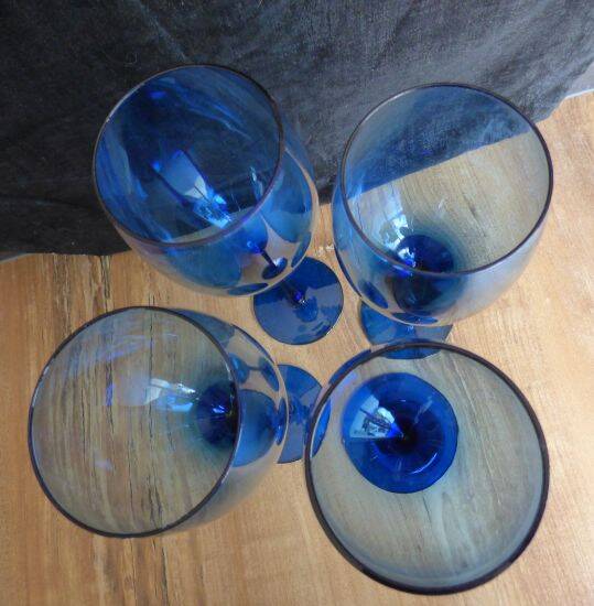 4 large vintage blue wine glasses.