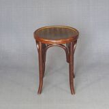 low bistro stool in curved wood laminated seat, circa 1920