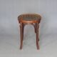 low bistro stool in curved wood laminated seat, circa 1920