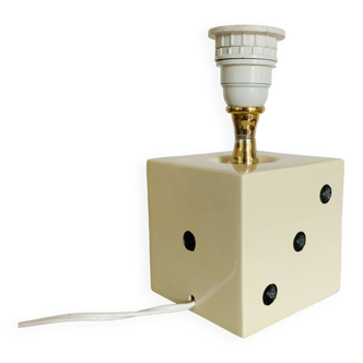 Lamp base representing a die