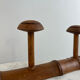 Wooden coat rack with three ball hooks.