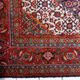 1940s vintage wool medallion rug, red and navy, 206 × 320 cm