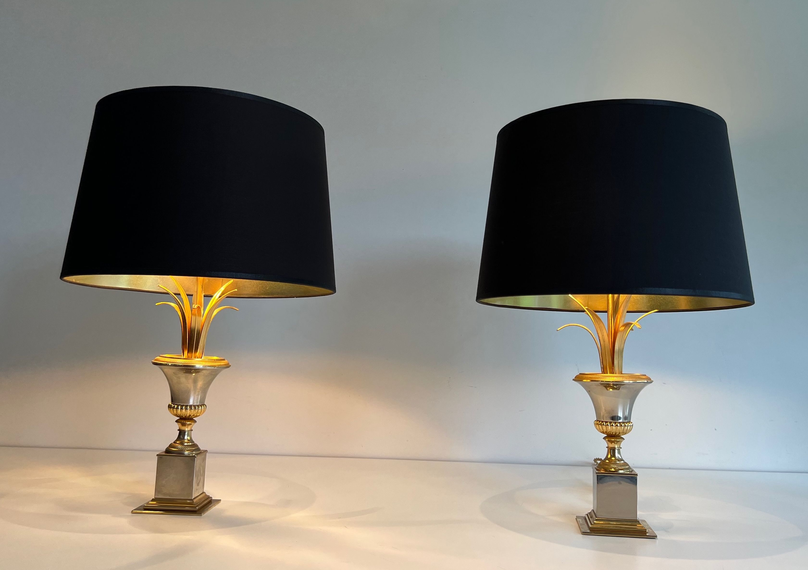 Pair of palm lamps in chrome and brass in the style of Maison Charles. Circa 1970.