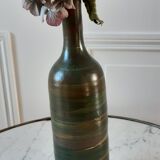 Bottle in sandstone 70s