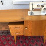 Vintage furniture with sewing machine light wood