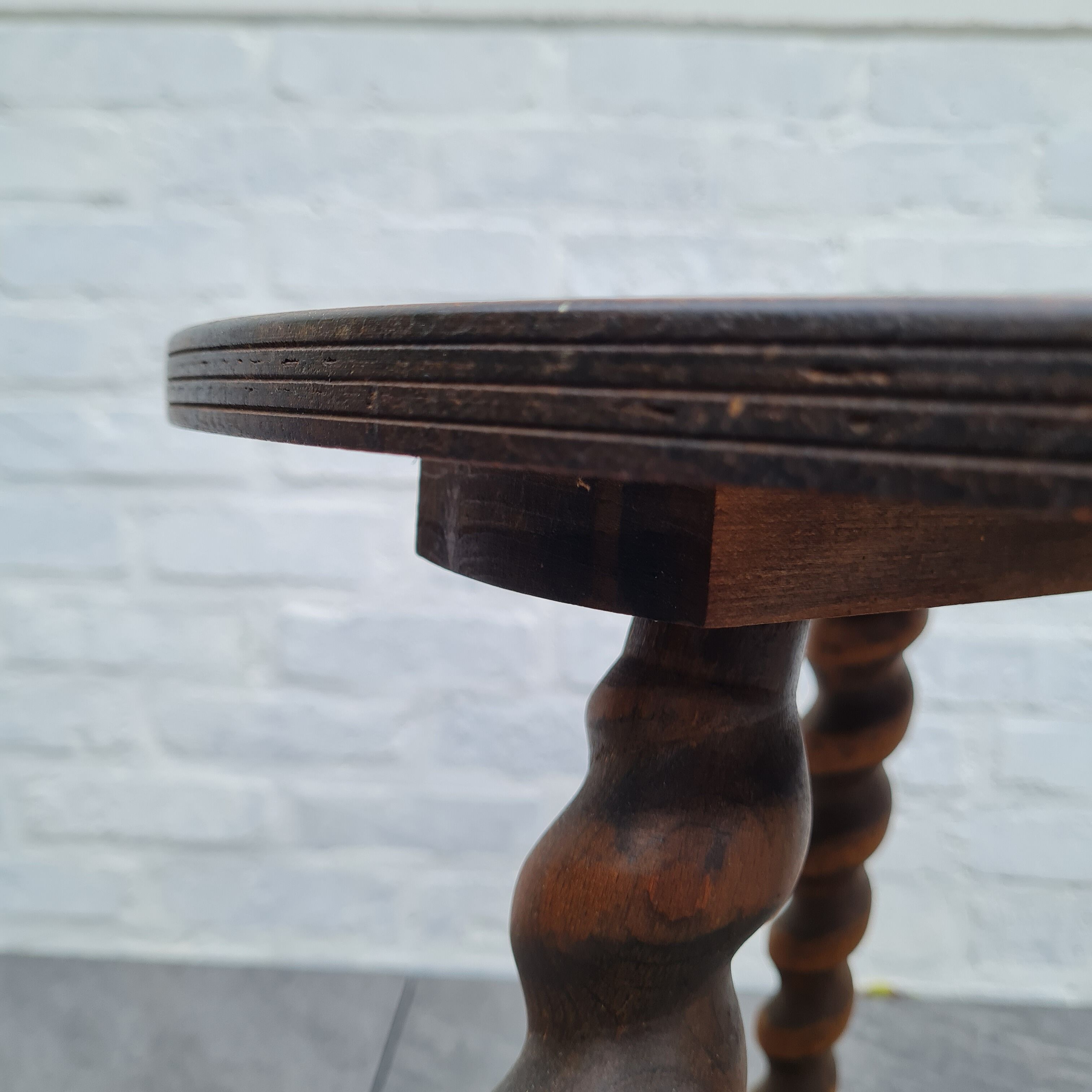 Wooden coffee table twisted tripod base