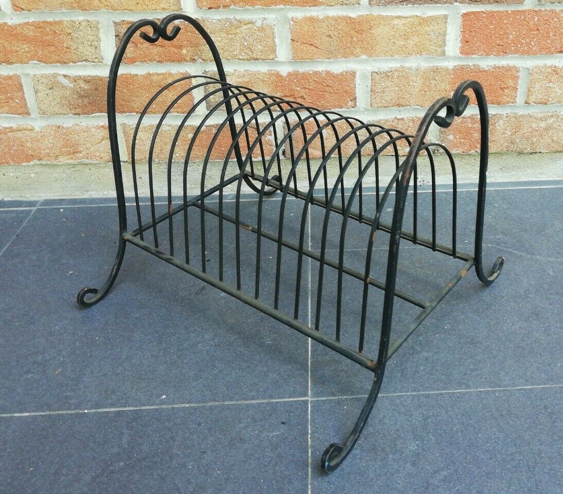Vintage wrought iron magazine holder