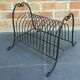 Vintage wrought iron magazine holder