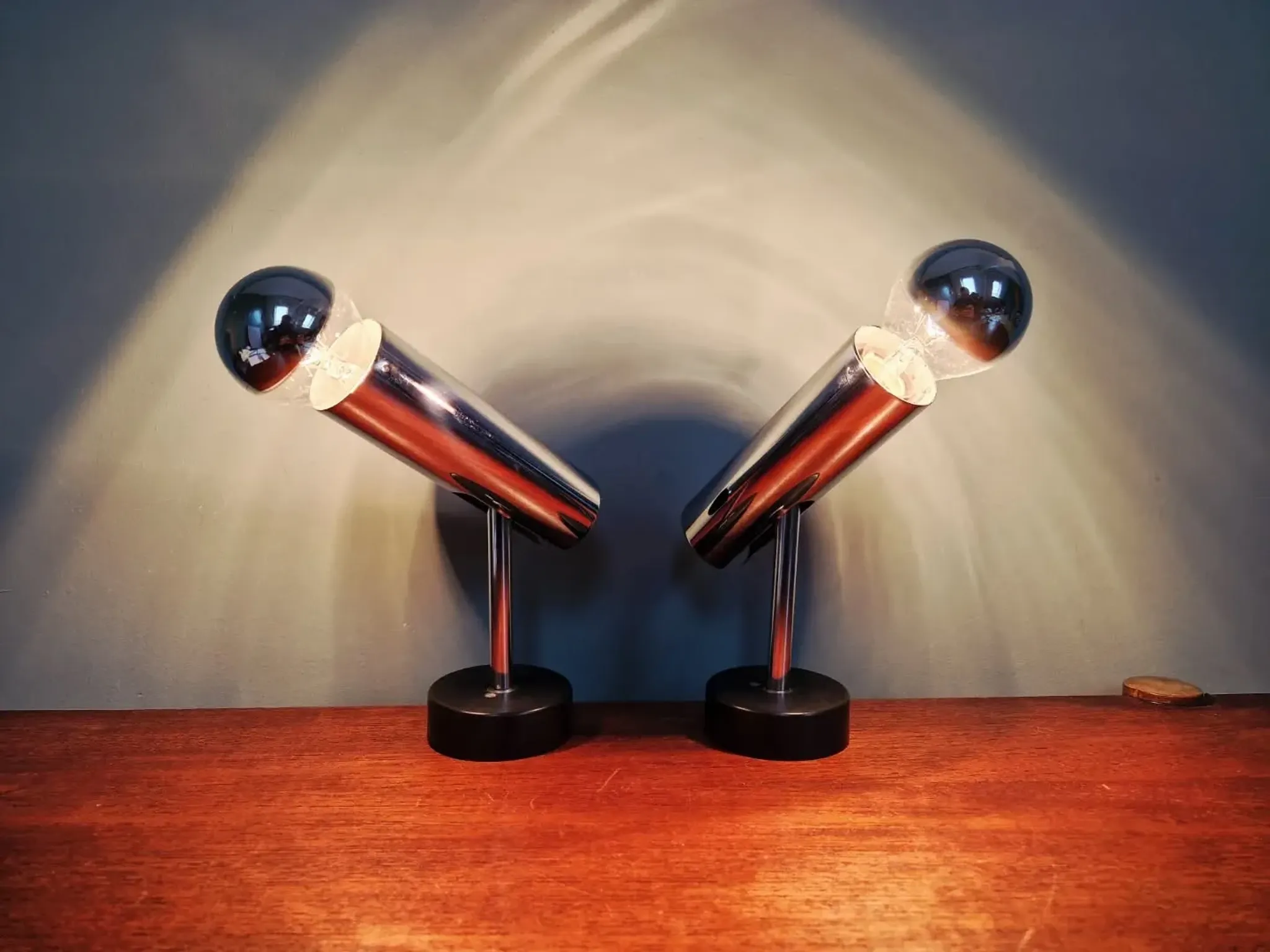 Pair of chrome metal wall lights, Staff Leuchten, Germany, 1970.