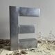 Metal sign letter E