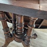 Coffee table in walnut with maple inlays and wheels