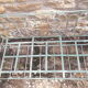 Former child bed in wrought iron