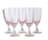 Cinq verres à pied rose dégradé et ciselés