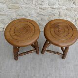 Pair of solid wood tripod stools, carved.