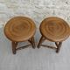 Pair of solid wood tripod stools, carved.
