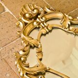Antique Baroque mirror with gilded metal panels