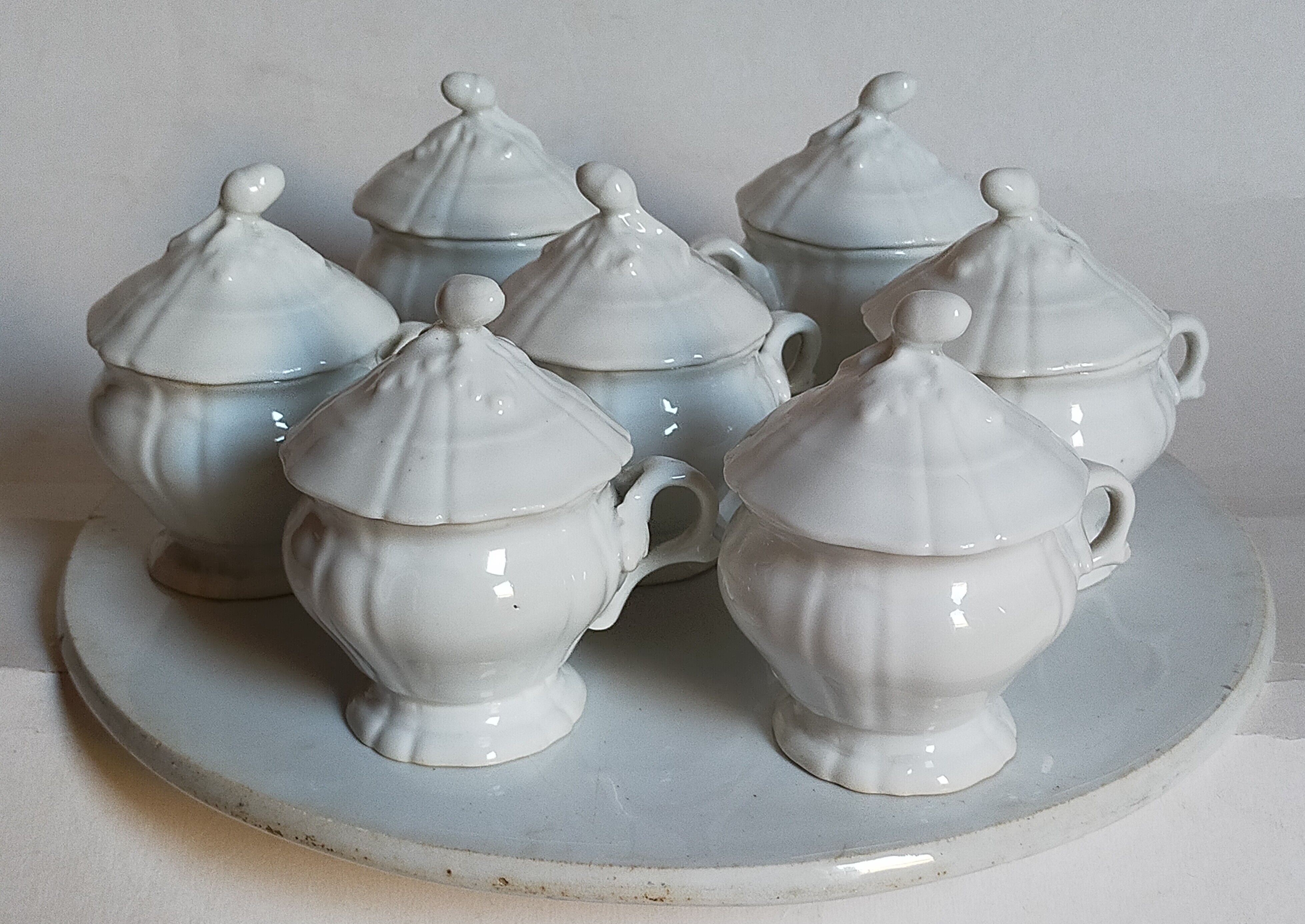 Set of seven covered pots and tray old white slurry nineteenth