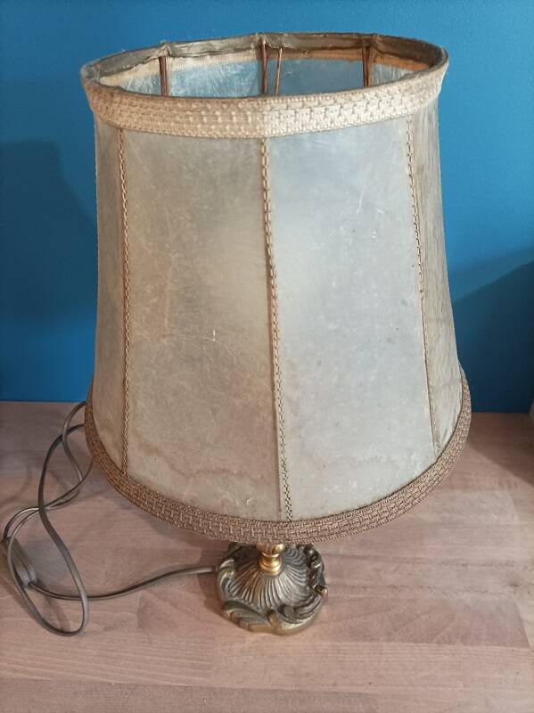 Living room lamp with golden bronze base and shade