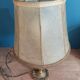 Living room lamp with golden bronze base and shade