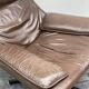 Fauteuil pivotant en cuir brun des années 1970