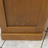 1950s oak office storage cabinet with curtains.