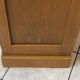 1950s oak office storage cabinet with curtains.